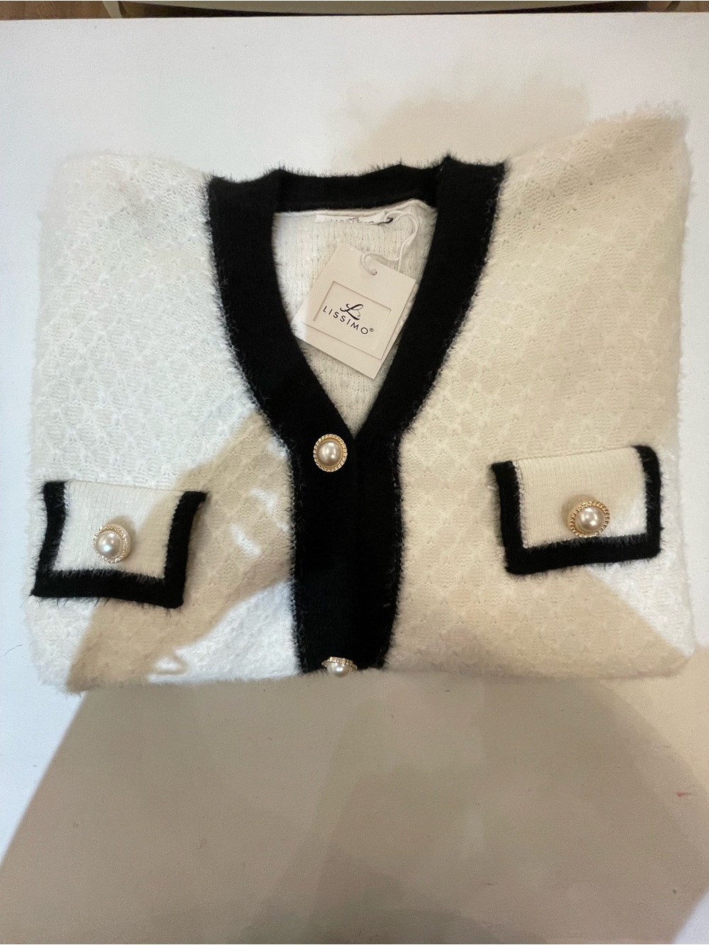 Ivory Knit Cardigan with Black Trim and Pearl Buttons - Picture 2 of 4